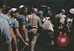 Image of Japanese prisoners leave captured submarines Pacific Theater, 1945, second 40 stock footage video 65675075961