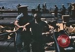 Image of Japanese prisoners leave captured submarines Pacific Theater, 1945, second 58 stock footage video 65675075961