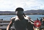 Image of Japanese prisoners leave captured submarines Pacific Theater, 1945, second 62 stock footage video 65675075961