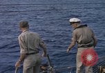 Standbild Evakuierung von Verletzten Pazifik, 1945, aus Sekunde 20 historischem Filmmaterial Videoclip 65675075988