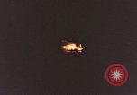 Image of A ship in flames at night Pacific Ocean, 1945, second 3 stock footage video 65675075997