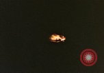 Image of A ship in flames at night Pacific Ocean, 1945, second 4 stock footage video 65675075997