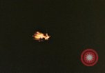 Image of A ship in flames at night Pacific Ocean, 1945, second 6 stock footage video 65675075997