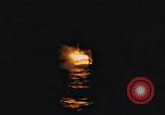 Image of A ship in flames at night Pacific Ocean, 1945, second 12 stock footage video 65675075997