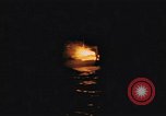 Image of A ship in flames at night Pacific Ocean, 1945, second 14 stock footage video 65675075997