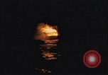 Image of A ship in flames at night Pacific Ocean, 1945, second 17 stock footage video 65675075997