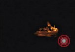 Image of A ship in flames at night Pacific Ocean, 1945, second 19 stock footage video 65675075997