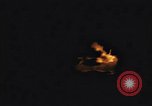 Image of A ship in flames at night Pacific Ocean, 1945, second 20 stock footage video 65675075997