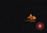 Image of A ship in flames at night Pacific Ocean, 1945, second 21 stock footage video 65675075997