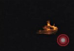 Image of A ship in flames at night Pacific Ocean, 1945, second 22 stock footage video 65675075997