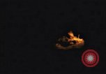 Image of A ship in flames at night Pacific Ocean, 1945, second 23 stock footage video 65675075997