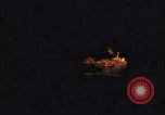 Image of A ship in flames at night Pacific Ocean, 1945, second 24 stock footage video 65675075997
