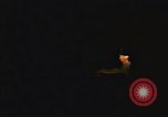 Image of A ship in flames at night Pacific Ocean, 1945, second 27 stock footage video 65675075997