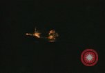 Image of A ship in flames at night Pacific Ocean, 1945, second 29 stock footage video 65675075997