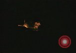 Image of A ship in flames at night Pacific Ocean, 1945, second 30 stock footage video 65675075997