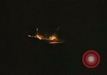 Image of A ship in flames at night Pacific Ocean, 1945, second 32 stock footage video 65675075997