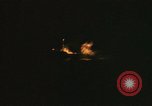Image of A ship in flames at night Pacific Ocean, 1945, second 34 stock footage video 65675075997