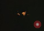 Image of A ship in flames at night Pacific Ocean, 1945, second 35 stock footage video 65675075997