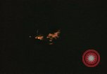 Image of A ship in flames at night Pacific Ocean, 1945, second 36 stock footage video 65675075997