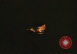 Image of A ship in flames at night Pacific Ocean, 1945, second 38 stock footage video 65675075997