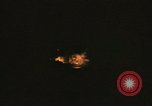 Image of A ship in flames at night Pacific Ocean, 1945, second 40 stock footage video 65675075997