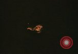 Image of A ship in flames at night Pacific Ocean, 1945, second 43 stock footage video 65675075997