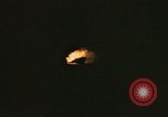 Image of A ship in flames at night Pacific Ocean, 1945, second 48 stock footage video 65675075997