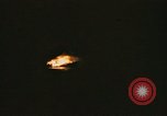 Image of A ship in flames at night Pacific Ocean, 1945, second 49 stock footage video 65675075997