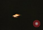 Image of A ship in flames at night Pacific Ocean, 1945, second 50 stock footage video 65675075997