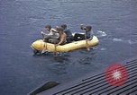 Image of US Sailors leave submarine and go ashore in life raft Japan, 1945, second 14 stock footage video 65675076035