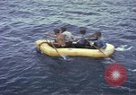 Image of US Sailors leave submarine and go ashore in life raft Japan, 1945, second 22 stock footage video 65675076035