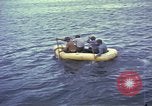 Image of US Sailors leave submarine and go ashore in life raft Japan, 1945, second 29 stock footage video 65675076035