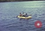Image of US Sailors leave submarine and go ashore in life raft Japan, 1945, second 33 stock footage video 65675076035
