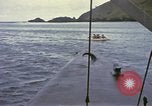 Image of US Sailors leave submarine and go ashore in life raft Japan, 1945, second 41 stock footage video 65675076035