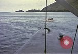 Image of US Sailors leave submarine and go ashore in life raft Japan, 1945, second 42 stock footage video 65675076035
