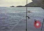 Image of US Sailors leave submarine and go ashore in life raft Japan, 1945, second 43 stock footage video 65675076035