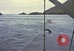 Image of US Sailors leave submarine and go ashore in life raft Japan, 1945, second 45 stock footage video 65675076035