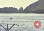 Image of US Sailors leave submarine and go ashore in life raft Japan, 1945, second 46 stock footage video 65675076035