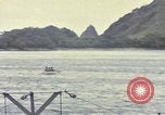 Image of US Sailors leave submarine and go ashore in life raft Japan, 1945, second 49 stock footage video 65675076035