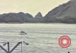 Image of US Sailors leave submarine and go ashore in life raft Japan, 1945, second 52 stock footage video 65675076035