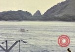Image of US Sailors leave submarine and go ashore in life raft Japan, 1945, second 53 stock footage video 65675076035