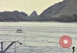Image of US Sailors leave submarine and go ashore in life raft Japan, 1945, second 54 stock footage video 65675076035