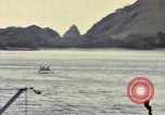 Image of US Sailors leave submarine and go ashore in life raft Japan, 1945, second 56 stock footage video 65675076035