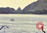 Image of US Sailors leave submarine and go ashore in life raft Japan, 1945, second 59 stock footage video 65675076035
