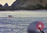 Image of US Sailors leave submarine and go ashore in life raft Japan, 1945, second 60 stock footage video 65675076035