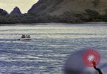 Image of US Sailors leave submarine and go ashore in life raft Japan, 1945, second 61 stock footage video 65675076035
