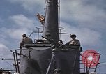 Standbild Amerikanisches U-Boot kommt nach der Patrouille in den Hafen Pazifik, 1945, aus Sekunde 37 historischem Filmmaterial Videoclip 65675076045