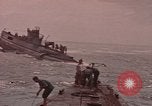 Image of USS Cod rescuing sailors from dutch submarine, O-19 Pacific Ocean, 1945, second 1 stock footage video 65675076084