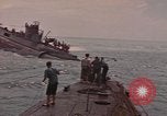 Image of USS Cod rescuing sailors from dutch submarine, O-19 Pacific Ocean, 1945, second 3 stock footage video 65675076084