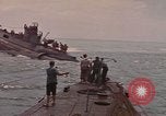 Image of USS Cod rescuing sailors from dutch submarine, O-19 Pacific Ocean, 1945, second 4 stock footage video 65675076084